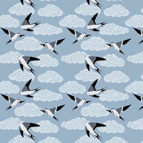 flying swallows / bird in a sky with clouds - blue - small scale