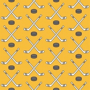 Smaller Scale Team Spirit NHL Hockey Sticks and Pucks in Boston Bruins Yellow Gold