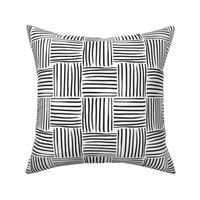 Large scale hand drawn geometric weave stripe block in black and white. 