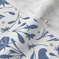 Parrots and flowers in storm blue with green and brown dots