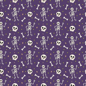 Small Halloween Skeleton Bones and Skulls on Purple