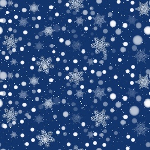 Falling snowflakes on blue