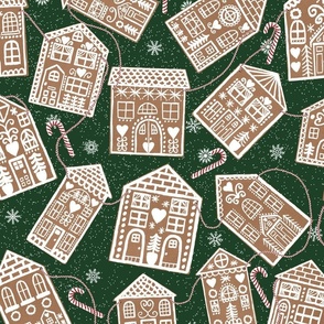 Christmas Gingerbread Cookie Houses Garland with Peppermint Candy Canes on Dark Green