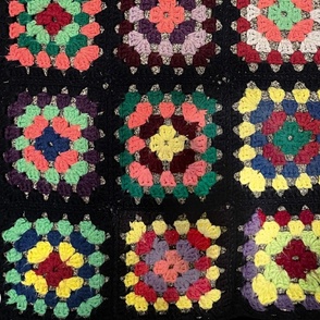 Crocheted Granny Squares on Black Background