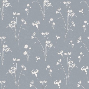Cream colour wildflower silhouette in pale grey blue background
