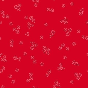 Ditsy Flower Scatter Pattern in Retro Cherry Red.