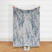 Shades of Serenity - blue grass with leaves in shades of blue on light grey with linen texture - large scale