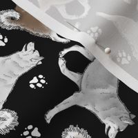 Trotting Alaskan Klee Kai and paw prints - black