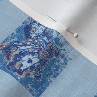 butterfly on blue linen