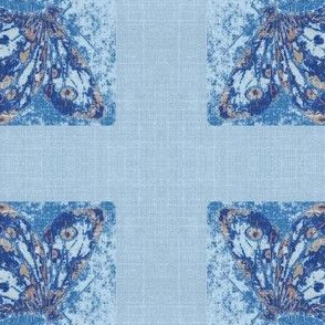 butterfly on blue linen