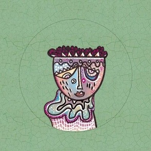 Surrealist whimsical doodled face in pastels embroidery hoop in 8” swatch for 6” embroidery hoop on sage green crackle background 2