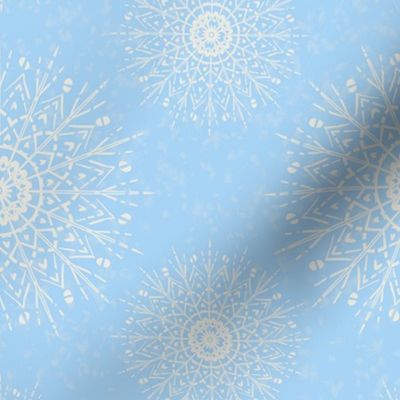 White Mandalas and snow on a light blue background - medium scale