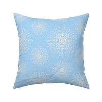 White Mandalas and snow on a light blue background - medium scale