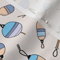 Out on the boat - fishing boat buoys freehand tossed retro marine design vintage neutral blue beige on ivory