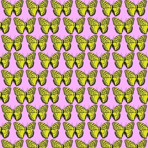 small spotted butterflies lime and black on pastel pink