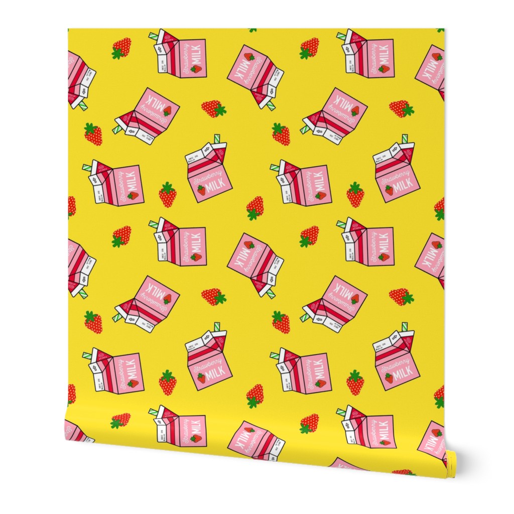 Strawberry Milk Carton With Straw & Strawberries On A Yellow  Background 