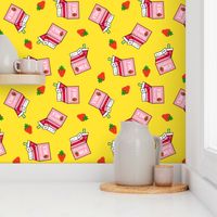 Strawberry Milk Carton With Straw & Strawberries On A Yellow  Background 