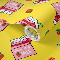 Strawberry Milk Carton With Straw & Strawberries On A Yellow  Background 