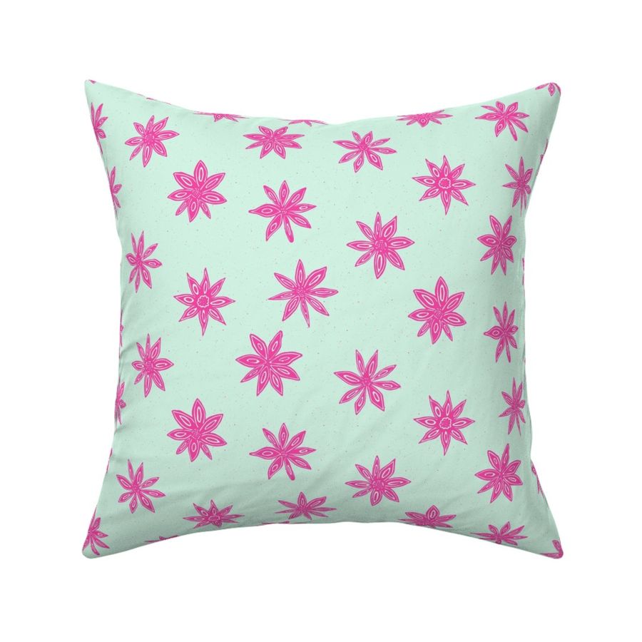 pink star anise on mint green | medium