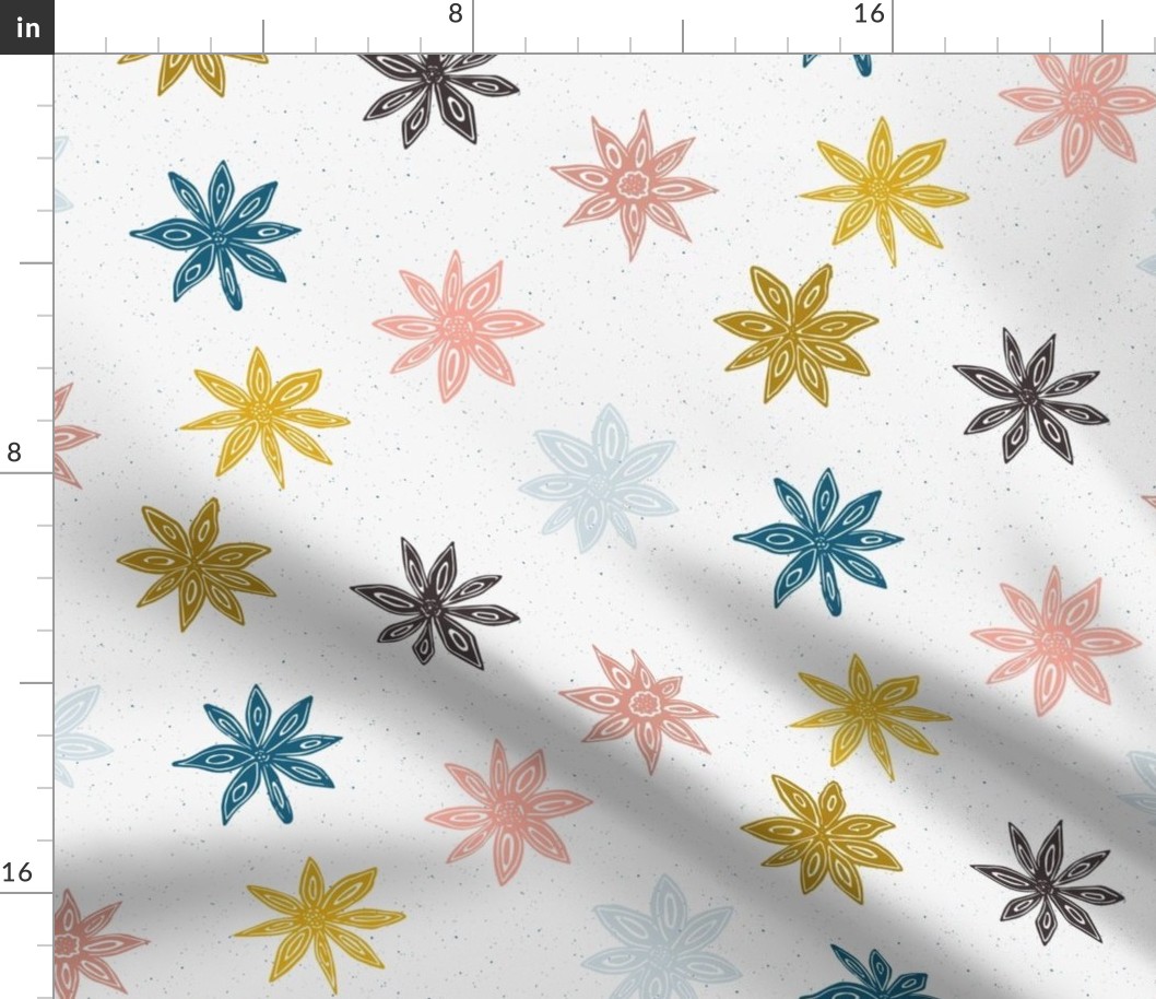 colorful star anise on light gray | large