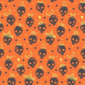 IMG_3190 skulls wearing party hats on orange background (medium)
