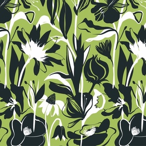 Black and white flowers on a green background