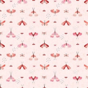 Small |  0.75’’  red and pink butterflies on light pink