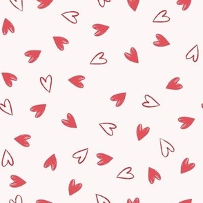 Medium | Tossed Valentine’s hand-drawn hearts and hearts outlines  in crimson red on linen white background 