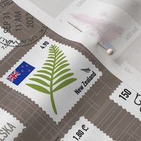 Countries postal stamps on textured beige. Travel adventure