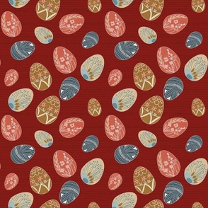 Easter eggs in multiple colors on a maroon background - tossed design - spring decorations