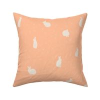 Spring Easter Bunny Rabbits and Florals on Pantone 2024 peach fuzz