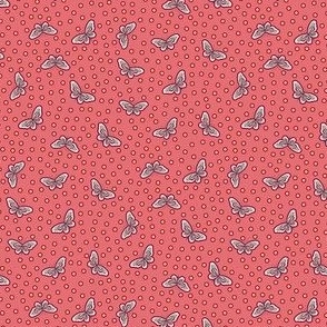 Bright coral polka dot pattern with simple turquoise butterflies flying around - small print.