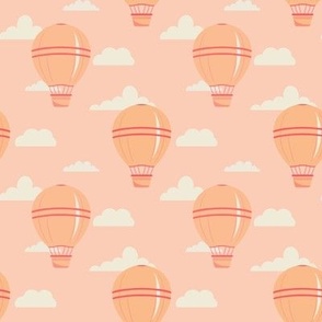 Peach fuzz balloon with white clouds seamless pattern