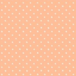 Cream white small polka dots on peach orange