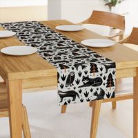 (L) Black Forest animals block print woodland black white