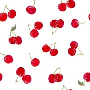 Tossed Cherries on white background.