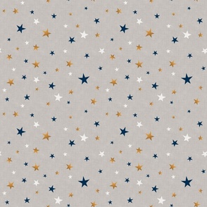 Gold, blue, and white stars on a light gray textured background. 