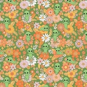 Cute Groovy Aliens with Flowers - Ditsy Scale - Green Background Novelty Floral Space Little Green Men Aliens 70s 1970s Orange Retro