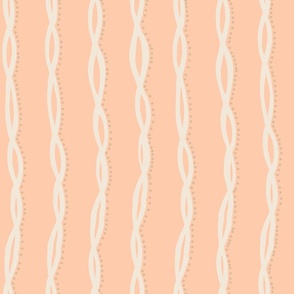 Whimsical Line of Cream Long Ribbon with Playful Beige Dots on Peach Fuzz