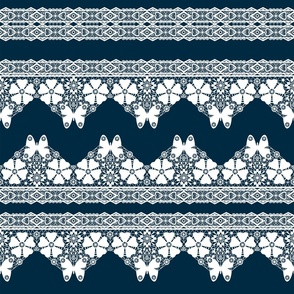 White vintage lace with butterflies on a dark blue background