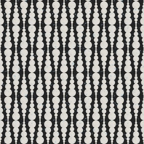 Small Abstract Block Printed Stacked Off-White Ecru Circles Dots On Soft Black with Light Blue speckles