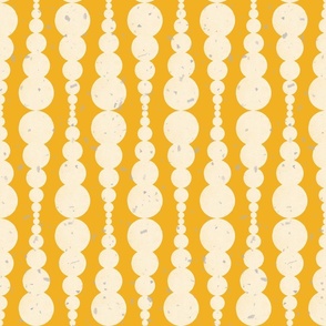 Large Abstract Block Printed Stacked Off-White Ecru Circles Dots On Amber Yellow with Grey speckles