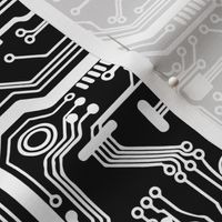 circuit board white traces on black