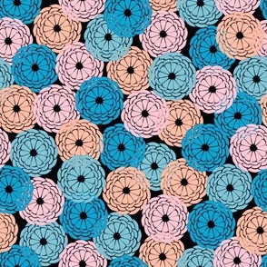 Crocheted Rounds in Teal, Blue, Pink and Orange on a Black Background