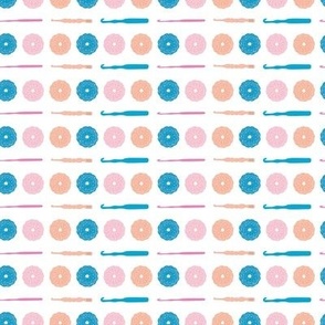 Horizontal Stripes of Crocheted Rounds and Crochet Hooks in Blue, Teal, Pink, and Orange on a White Background