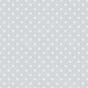 Light grey polka dot texture.