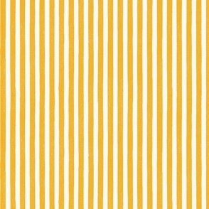 Small block printed thick vertical stripes in amber yellow on off-white ecru