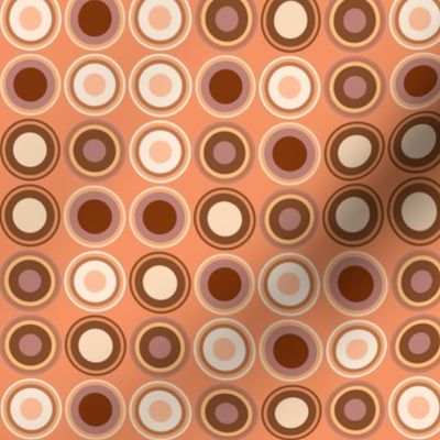 (S) geometric circles and rings in brown and orange colors on coral orange background