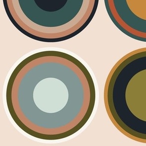 Circles in taupe brown, grey, beige, olive green, orange, salmon red on apricot