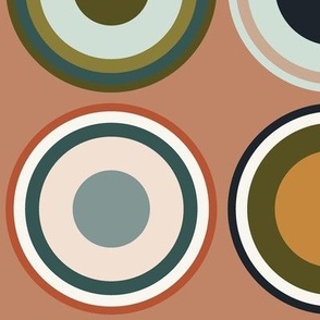 Circles in taupe brown, grey, beige, olive green, orange, salmon red, apricot on salmon orange